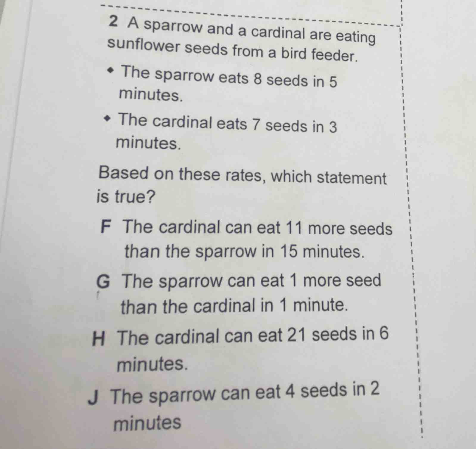 2 a sparrow and a cardinal are eating sunflower seeds from a bird feede…
