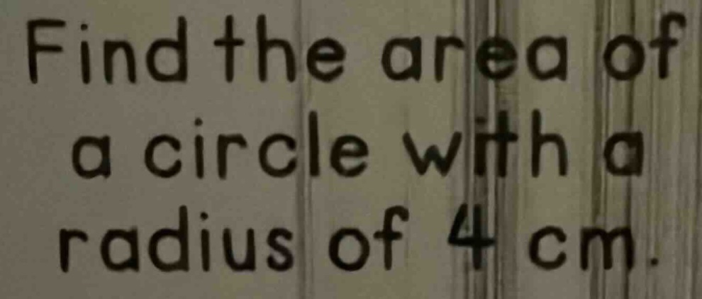 find the area of a circle with a radius of 4 cm.