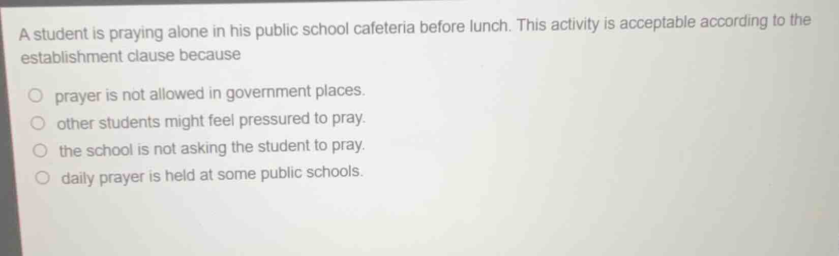 a student is praying alone in his public school cafeteria before lunch.…