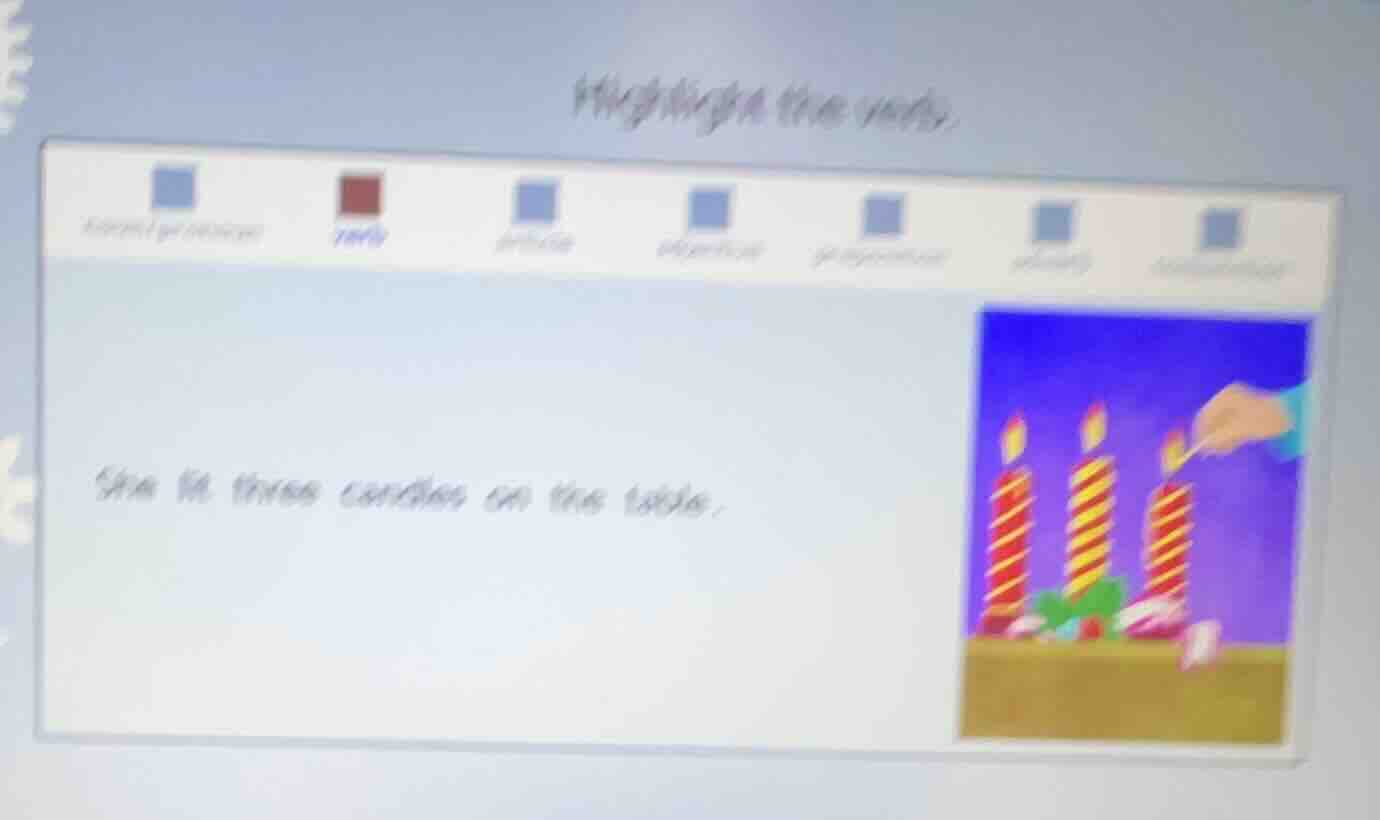 highlight the verb. she lit three candles on the table.