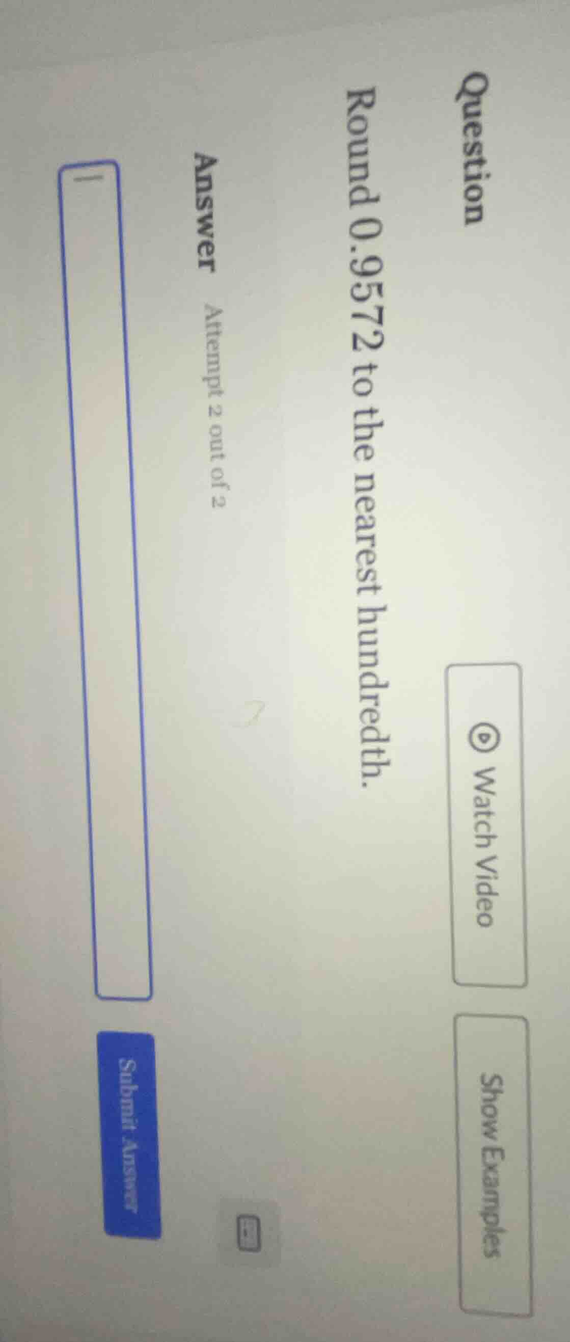 question round 0.9572 to the nearest hundredth. answer attempt 2 out of…
