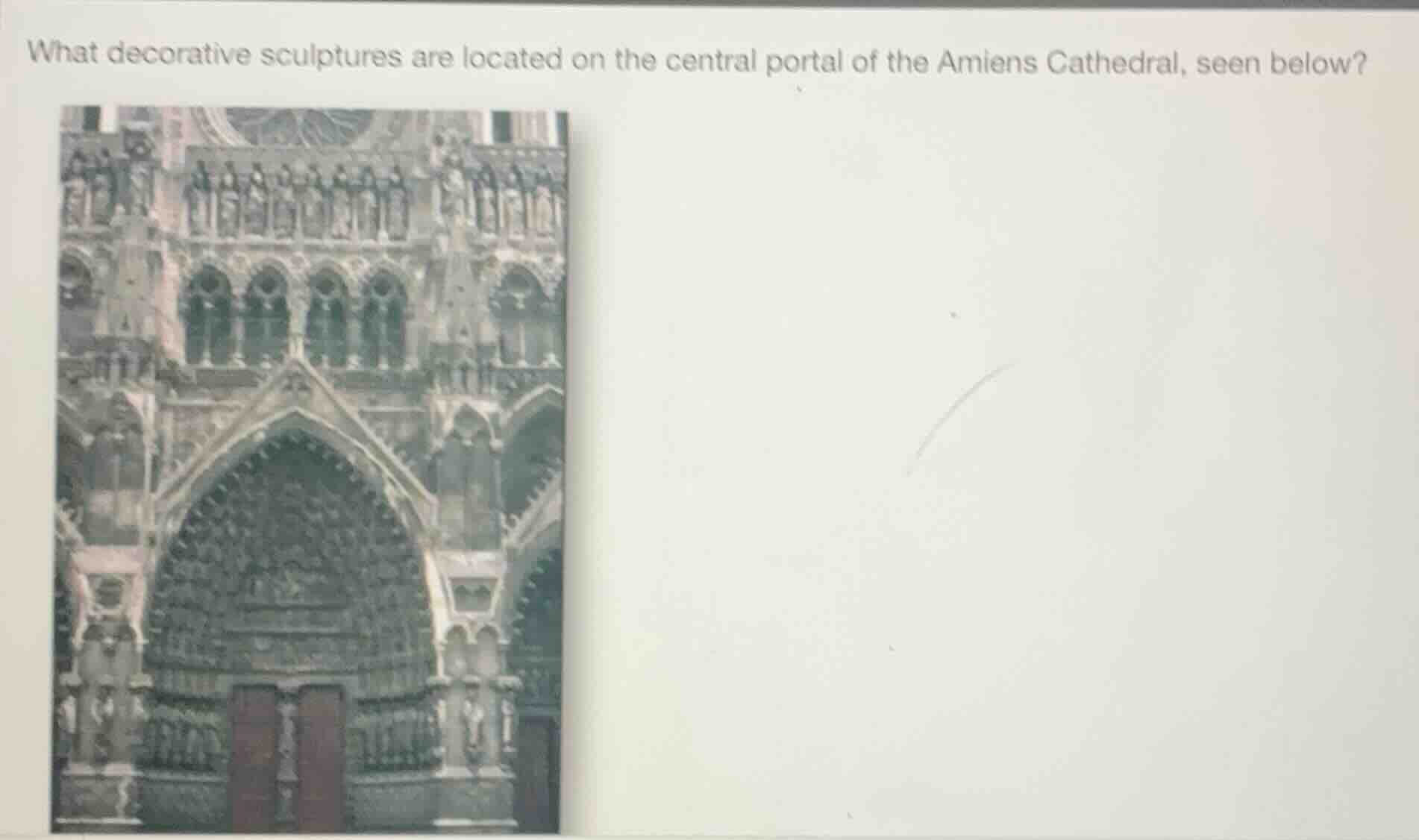 what decorative sculptures are located on the central portal of the ami…