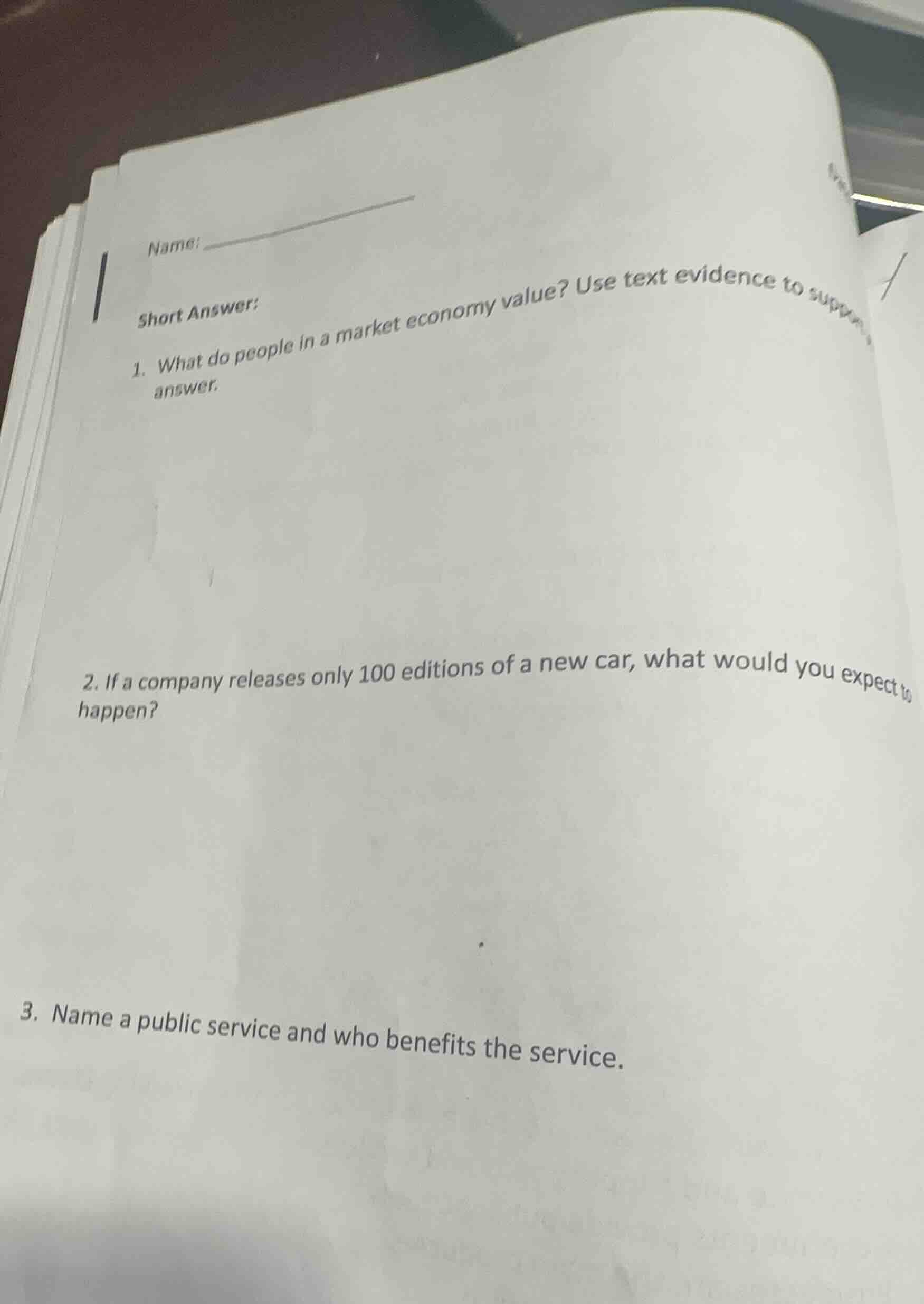 name: short answer: 1. what do people in a market economy value? use te…