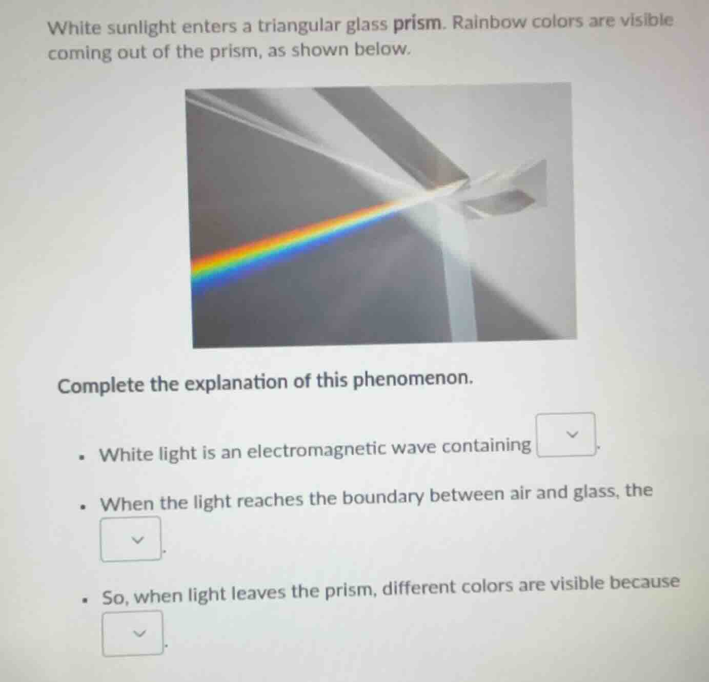 white sunlight enters a triangular glass prism. rainbow colors are visi…