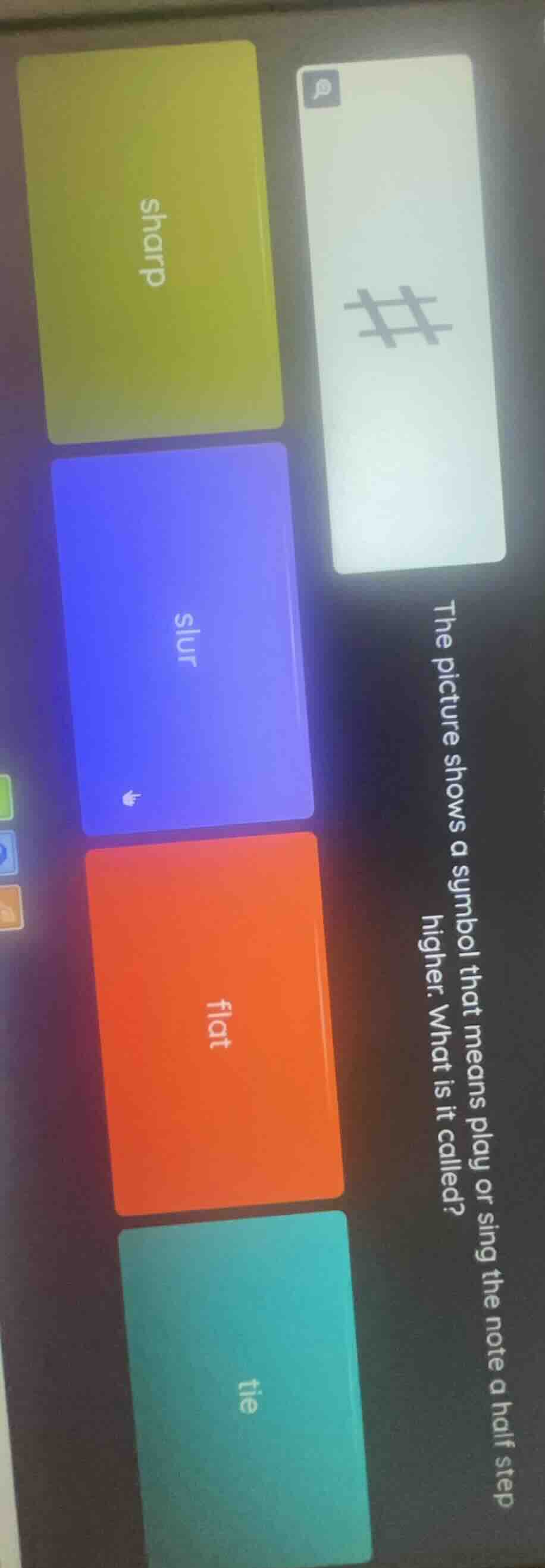 the picture shows a symbol that means play or sing the note a half step…