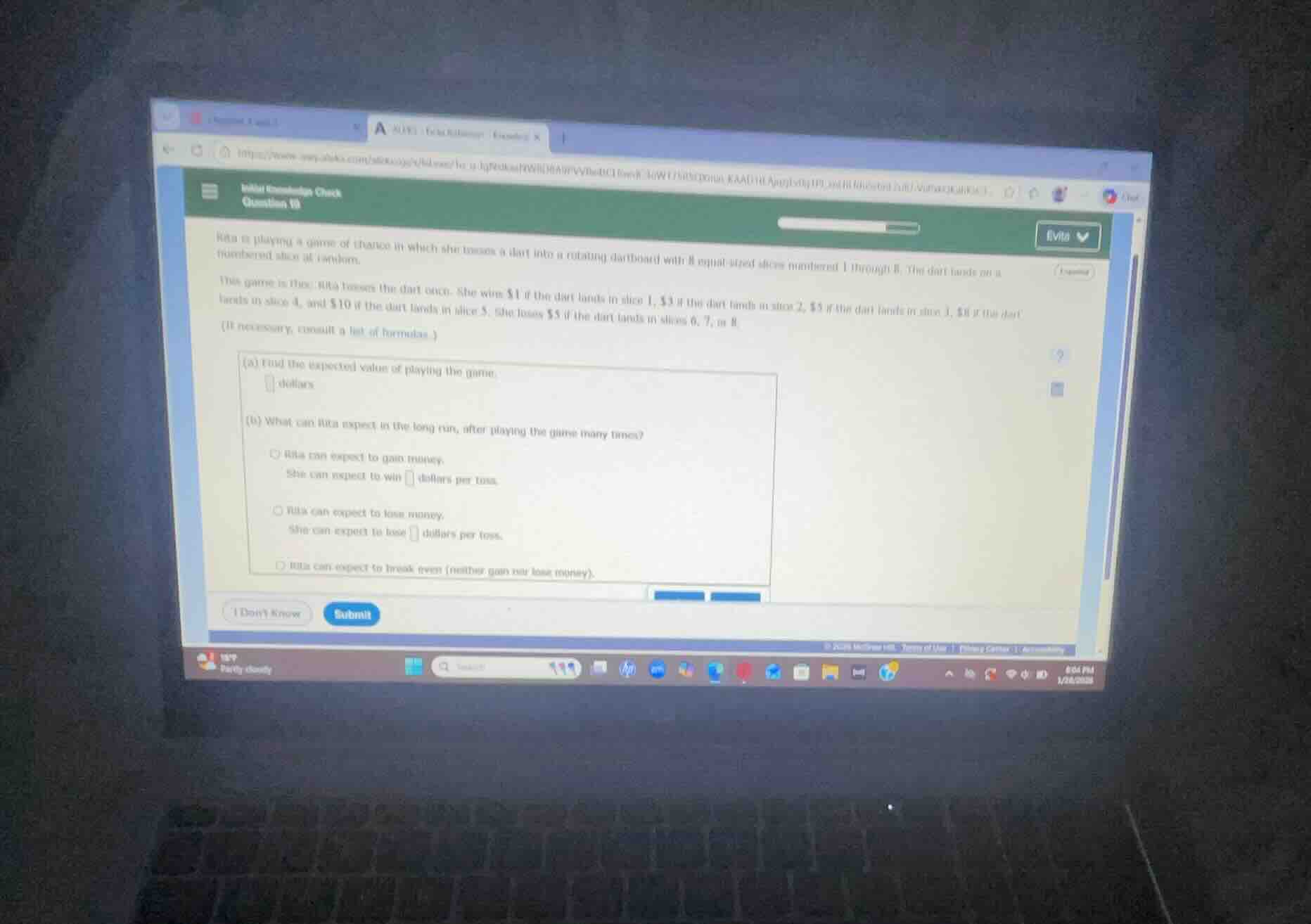 rita is playing a game of chance in which she tosses a dart into a rota…