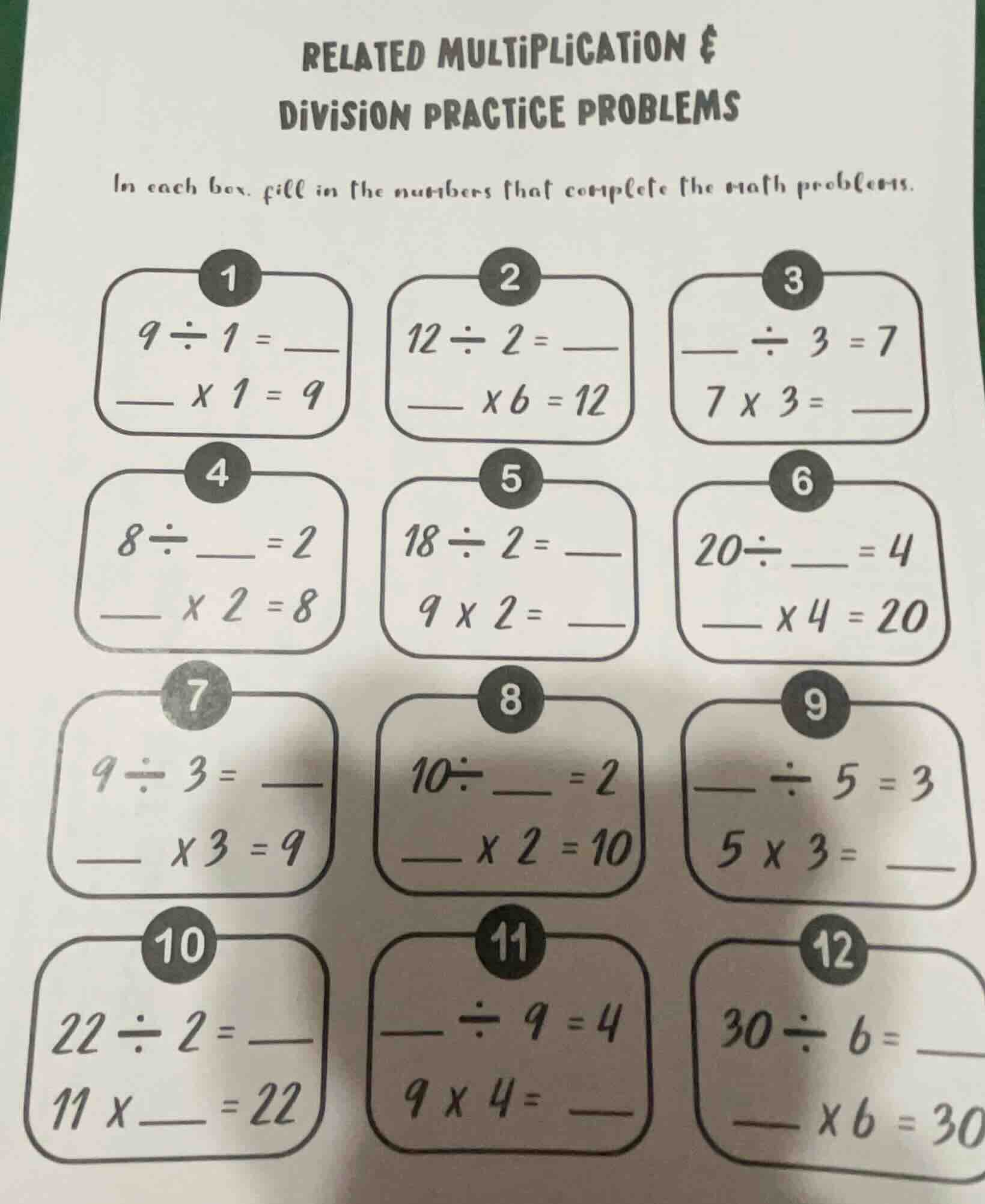 related multiplication & division practice problems in each box, fill i…
