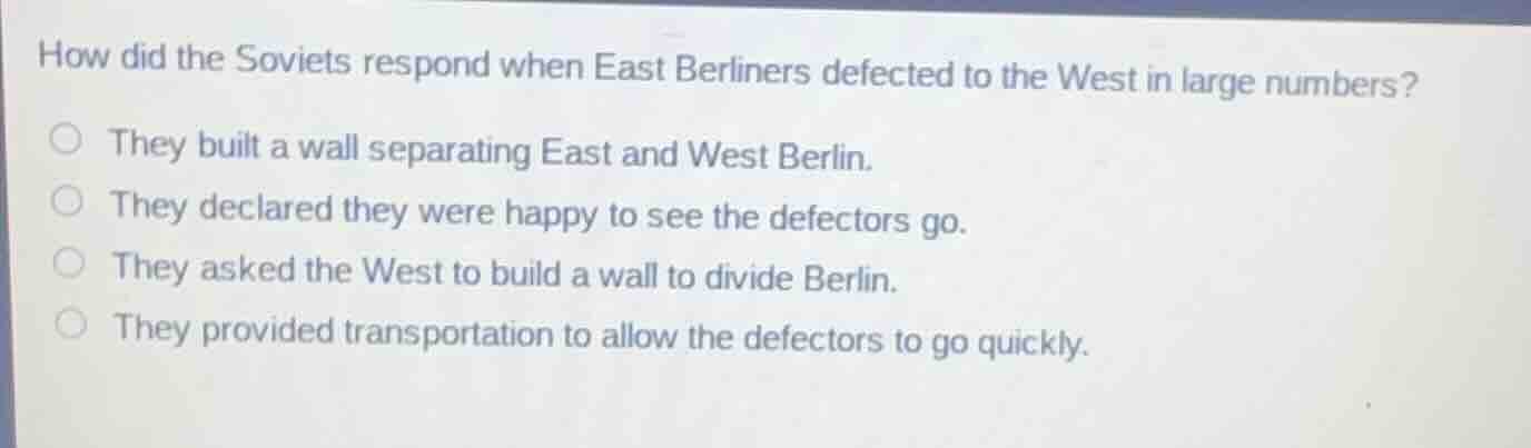 how did the soviets respond when east berliners defected to the west in…