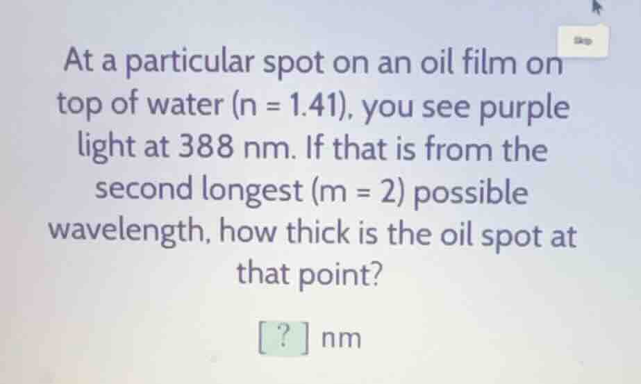at a particular spot on an oil film on top of water (n = 1.41), you see…