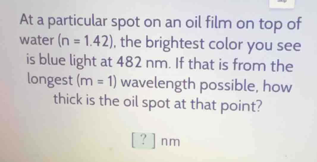 at a particular spot on an oil film on top of water (n = 1.42), the bri…