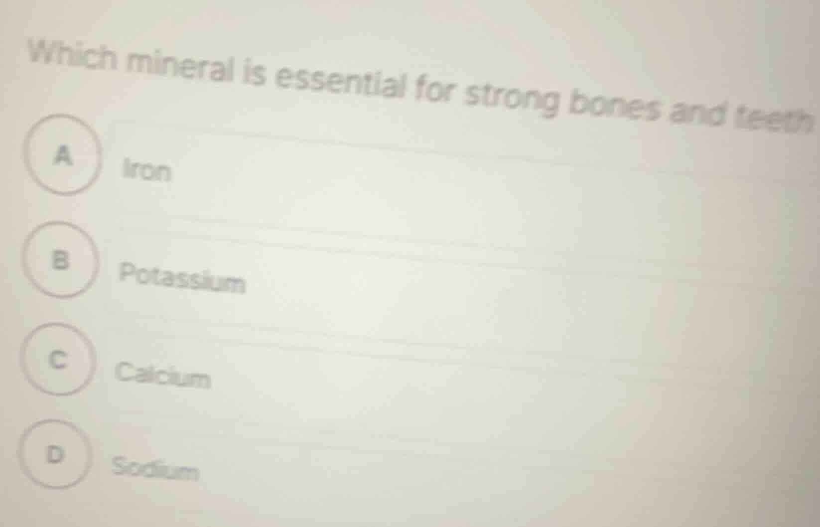 which mineral is essential for strong bones and teeth a iron b potassiu…