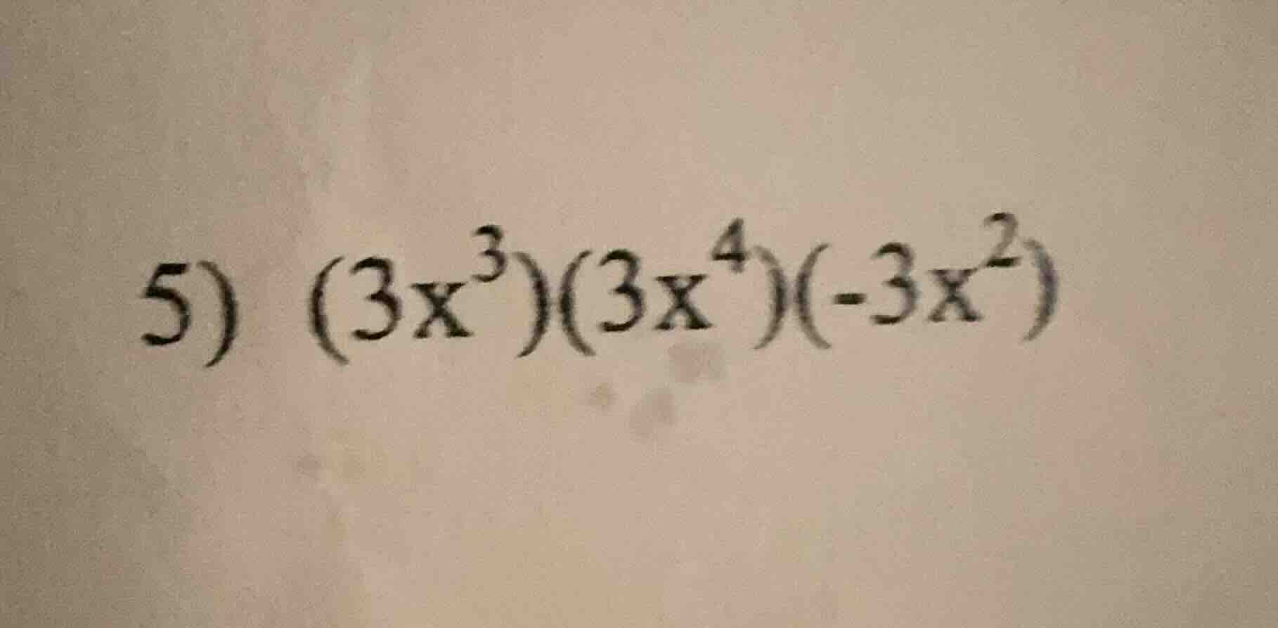 5) $(3x^{3})(3x^{4})(-3x^{2})$