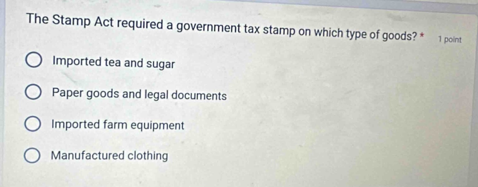 the stamp act required a government tax stamp on which type of goods? *…