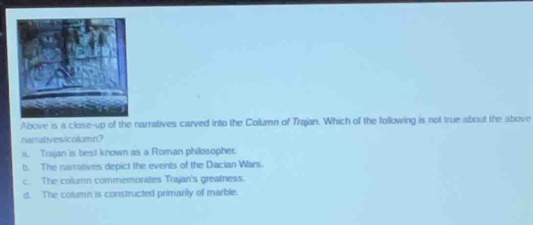 above is a close - up of the narratives carved into the column of traja…