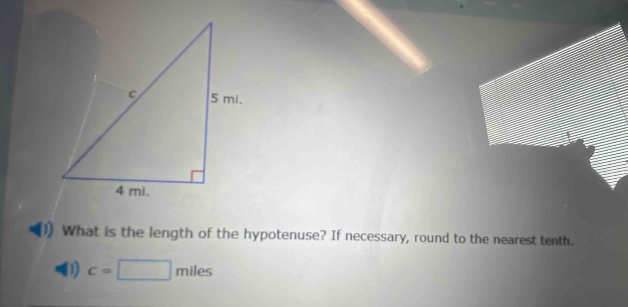 what is the length of the hypotenuse? if necessary, round to the neares…