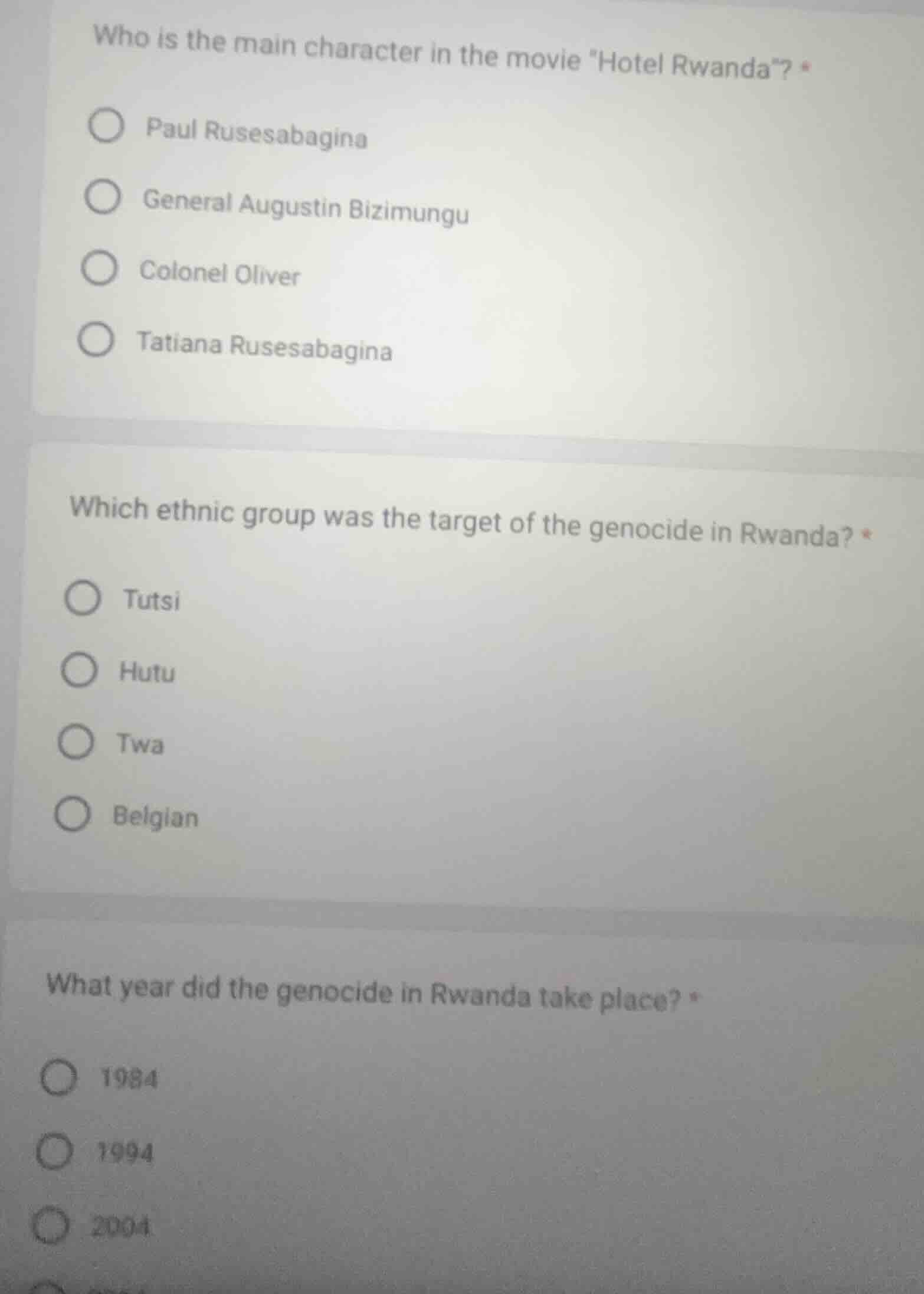 who is the main character in the movie \hotel rwanda\? paul rusesabagin…