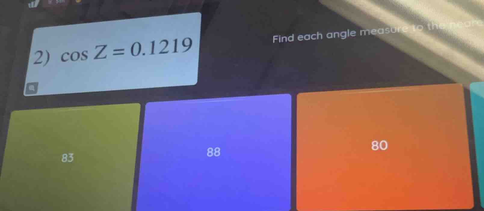 2) \\(\\cos z = 0.1219\\) find each angle measure to the neare