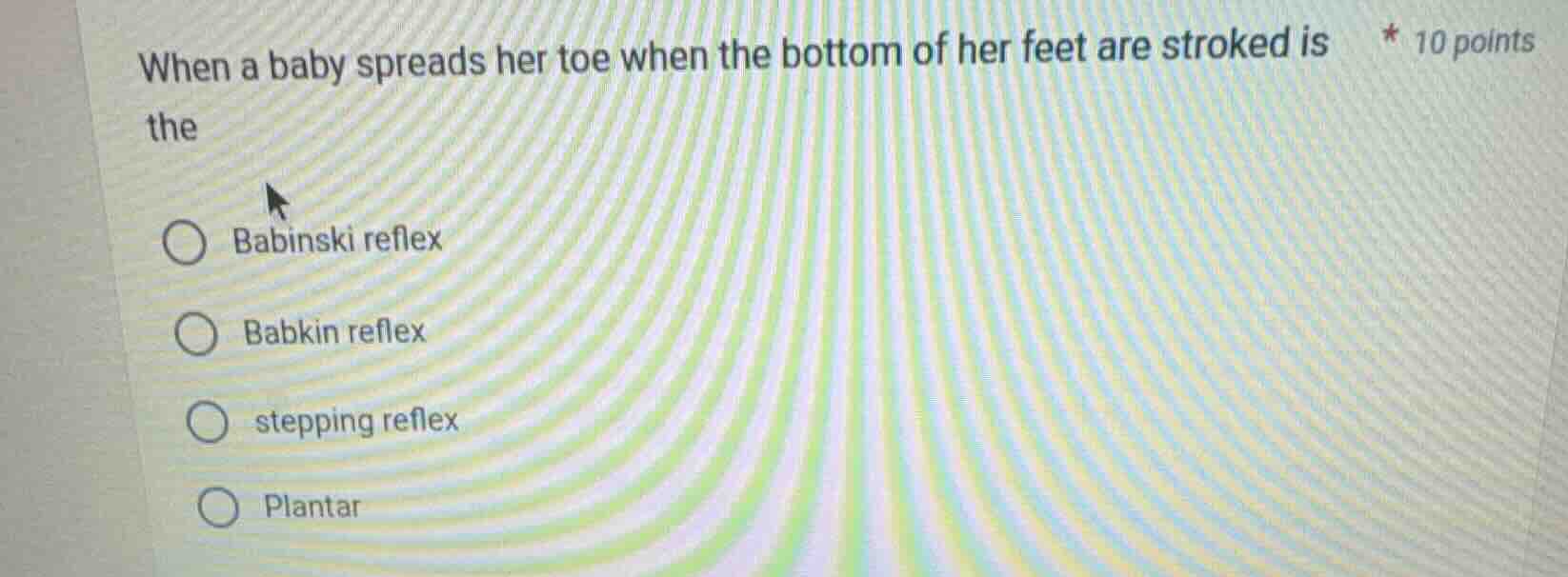 when a baby spreads her toe when the bottom of her feet are stroked is …