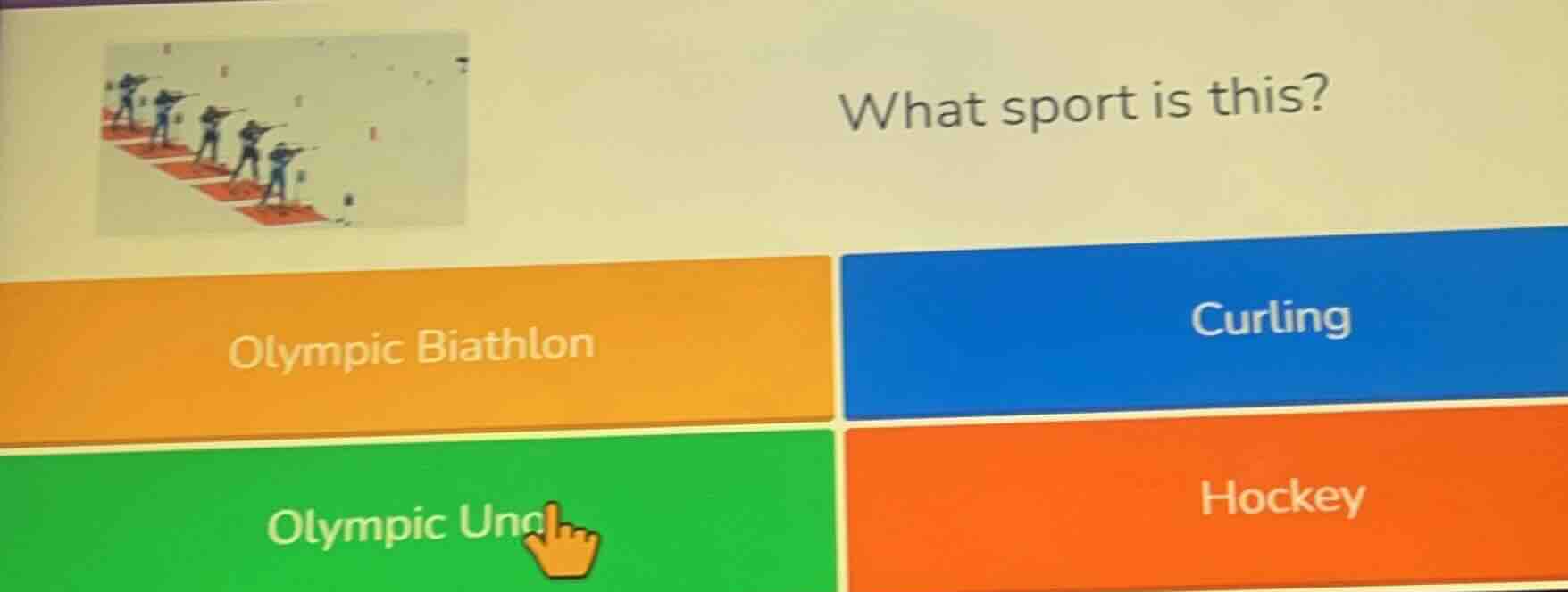 what sport is this? olympic biathlon curling olympic uno hockey