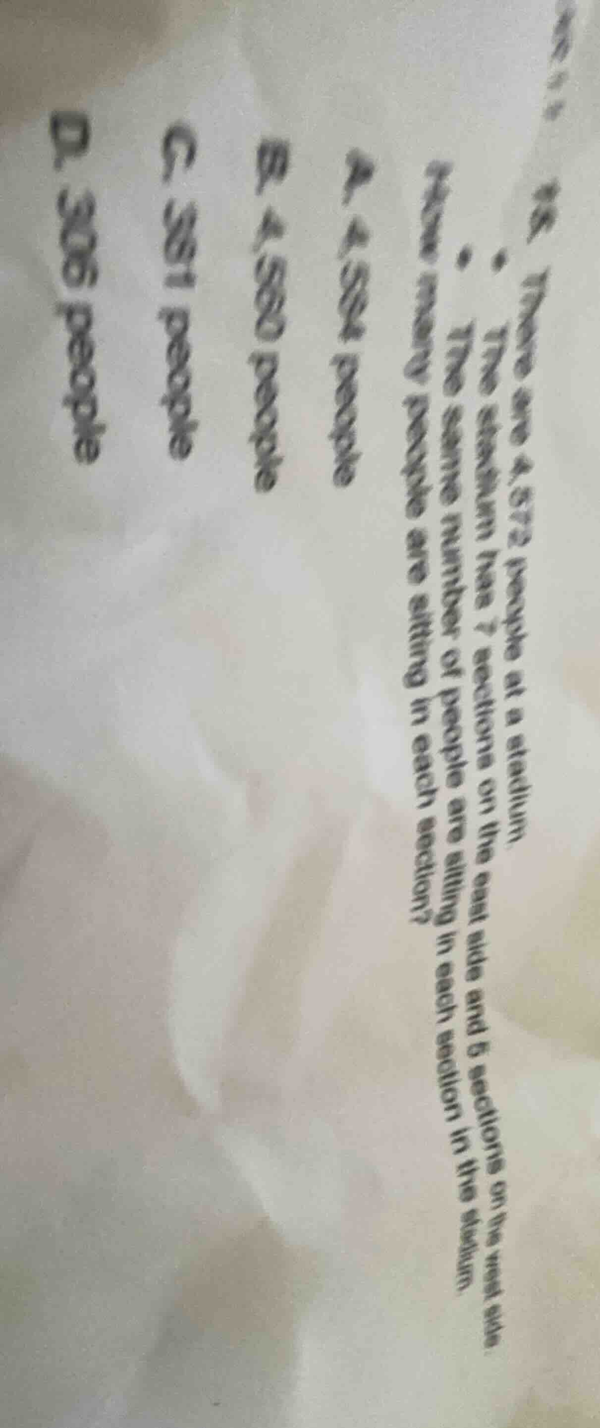 there are 4872 people at a stadium. the stadium has 7 sections on the e…