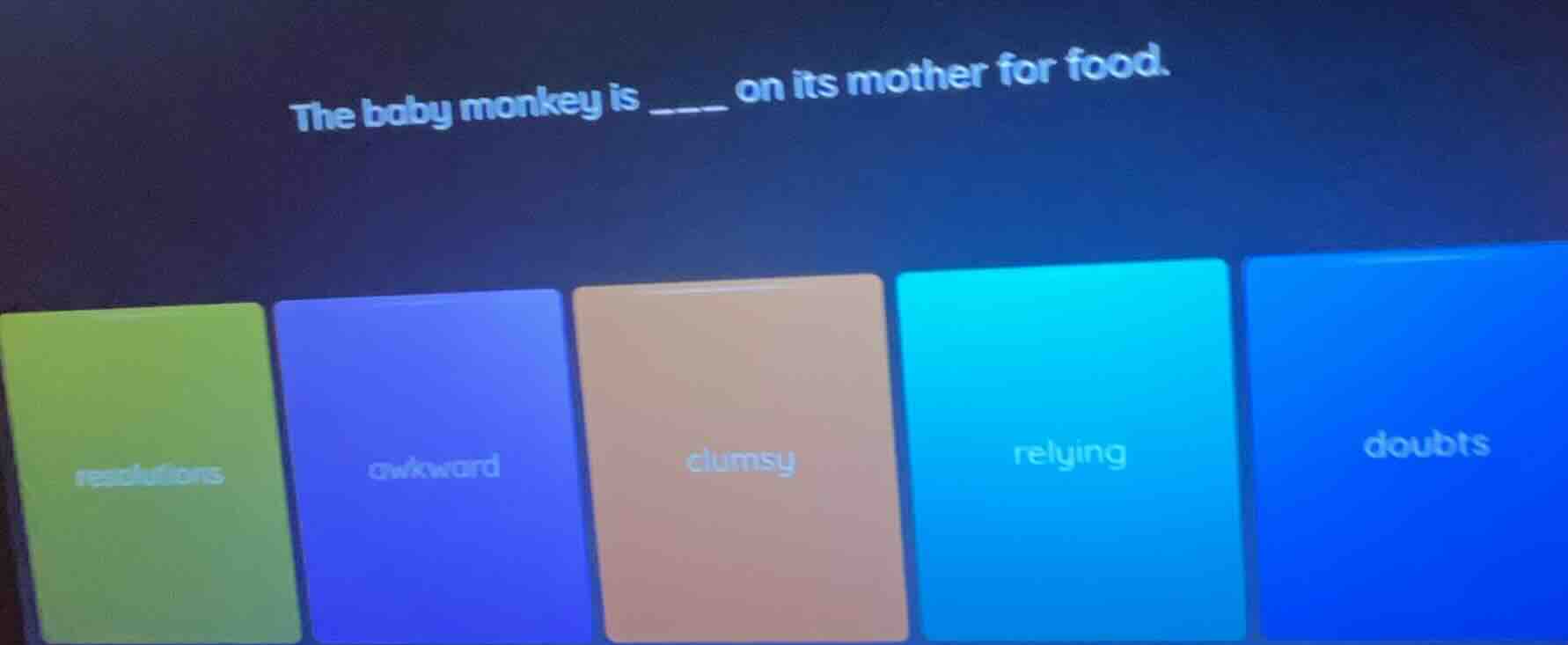 the baby monkey is ____ on its mother for food. resolutions awkward clu…