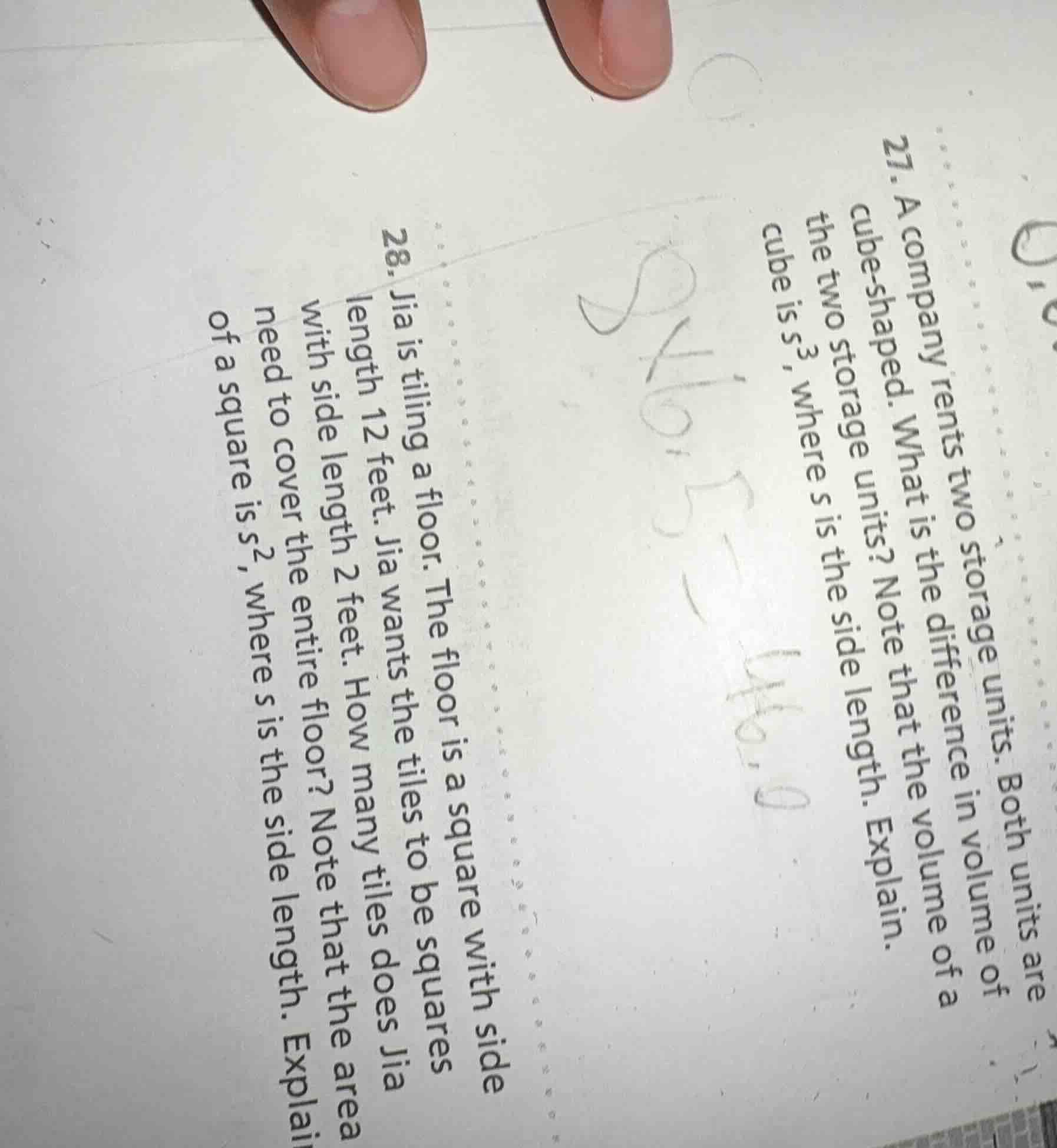 27. a company rents two storage units. both units are cube - shaped. wh…