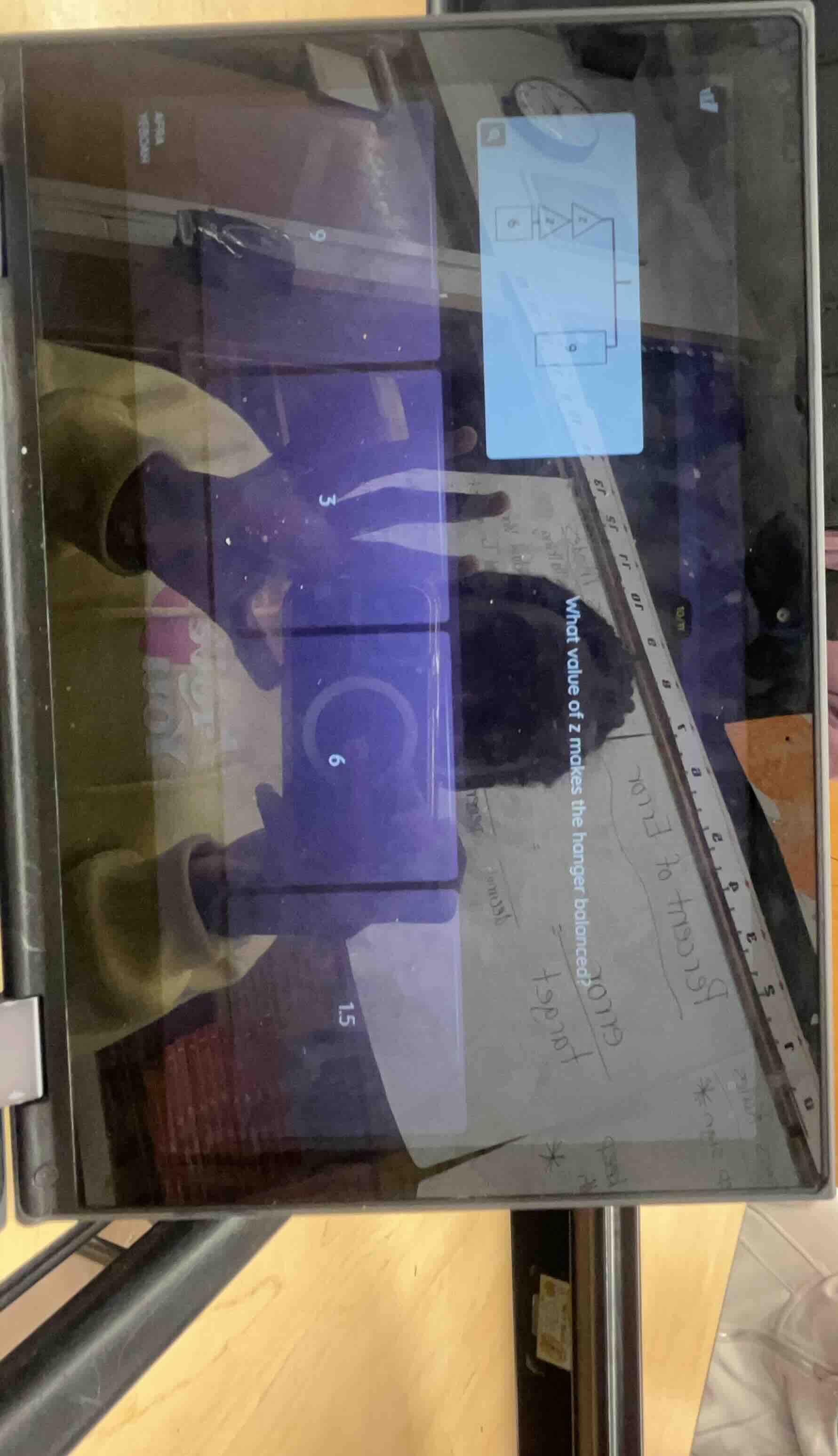 what value of z makes the hanger balanced?