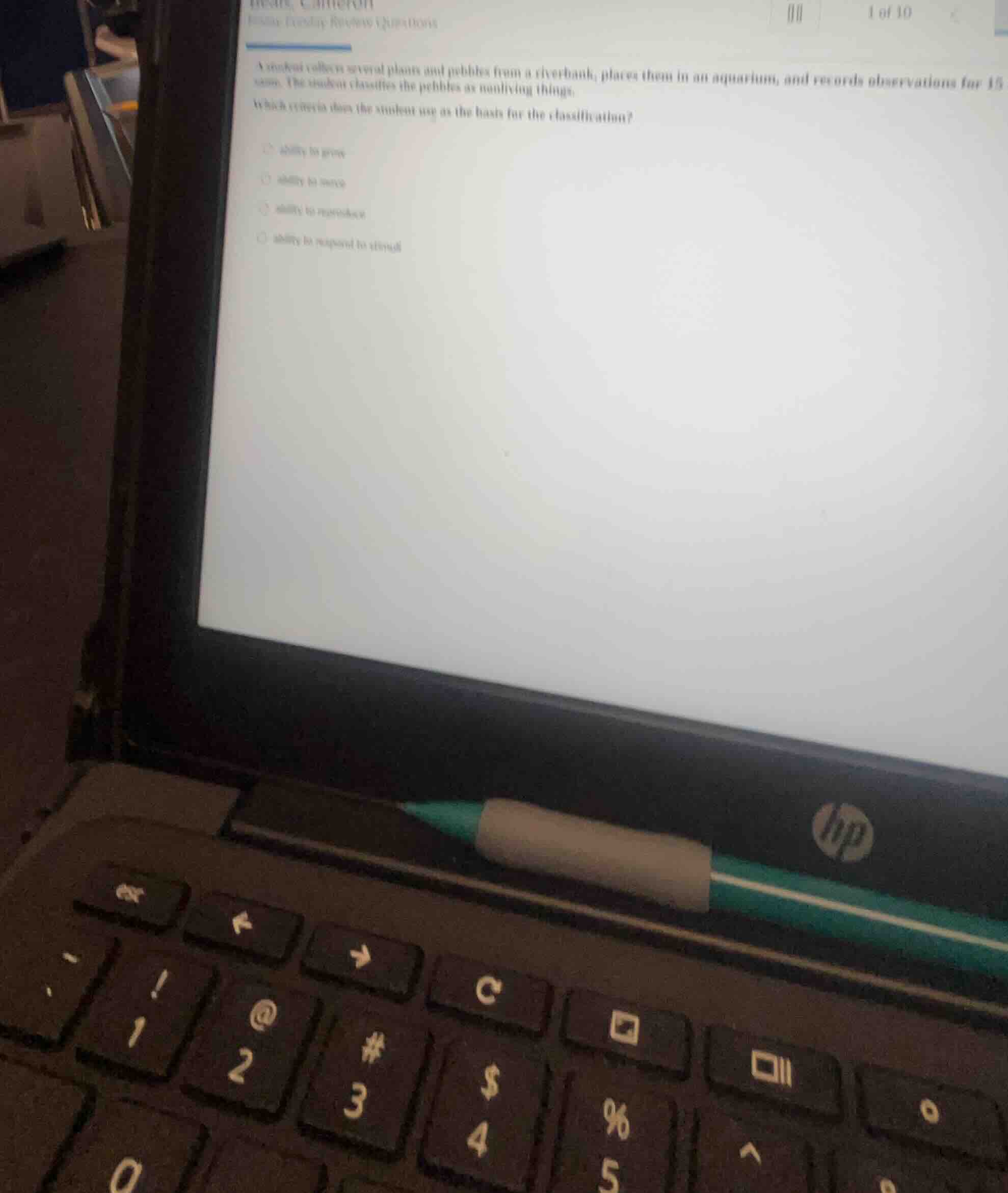 a student collects several plants and pebbles from a riverbank, places …