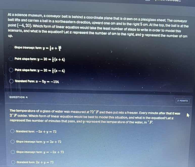 at a science museum, a conveyor belt is behind a coordinate plane that …