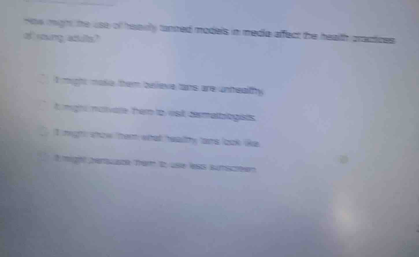 how might the use of heavily tanned models in media affect the health p…