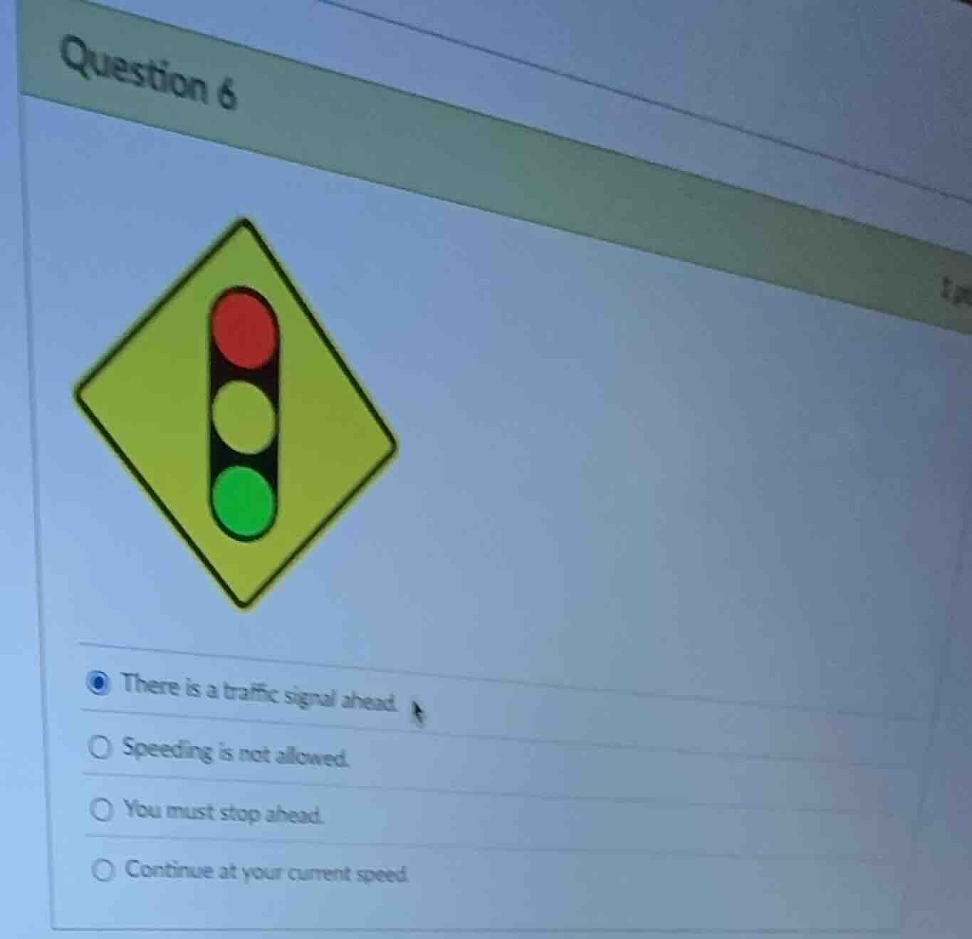 question 6 there is a traffic signal ahead. speeding is not allowed. yo…