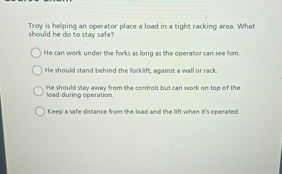 troy is helping an operator place a load in a tight racking area. what …