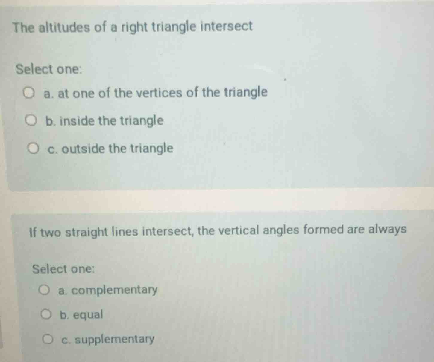 the altitudes of a right triangle intersect select one: a. at one of th…