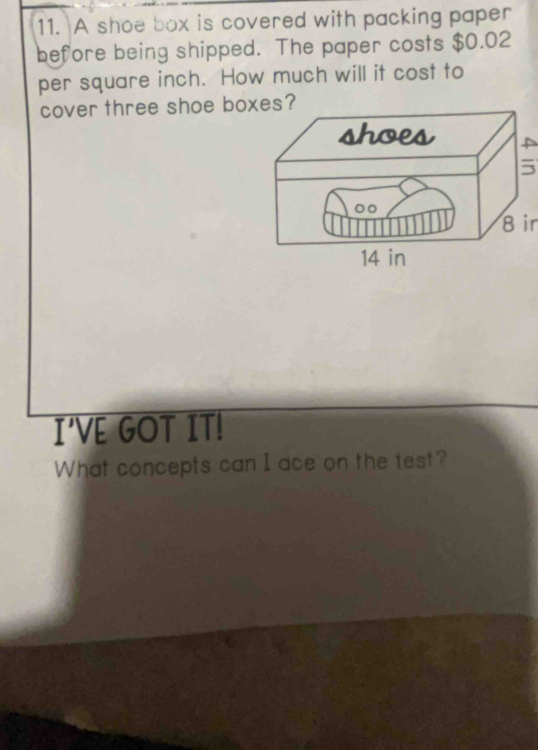 11. a shoe box is covered with packing paper before being shipped. the …