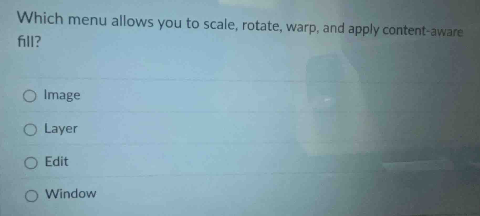 which menu allows you to scale, rotate, warp, and apply content-aware f…