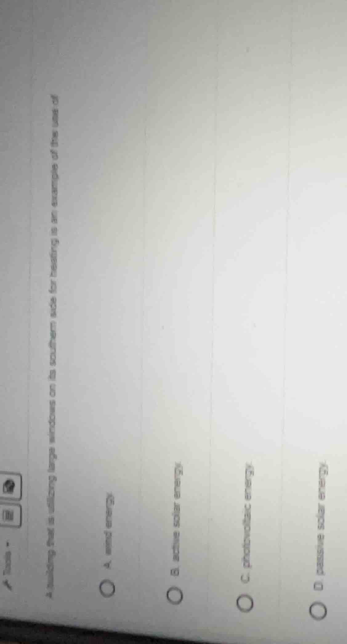 a building that is utilizing large windows on its southern side for hea…