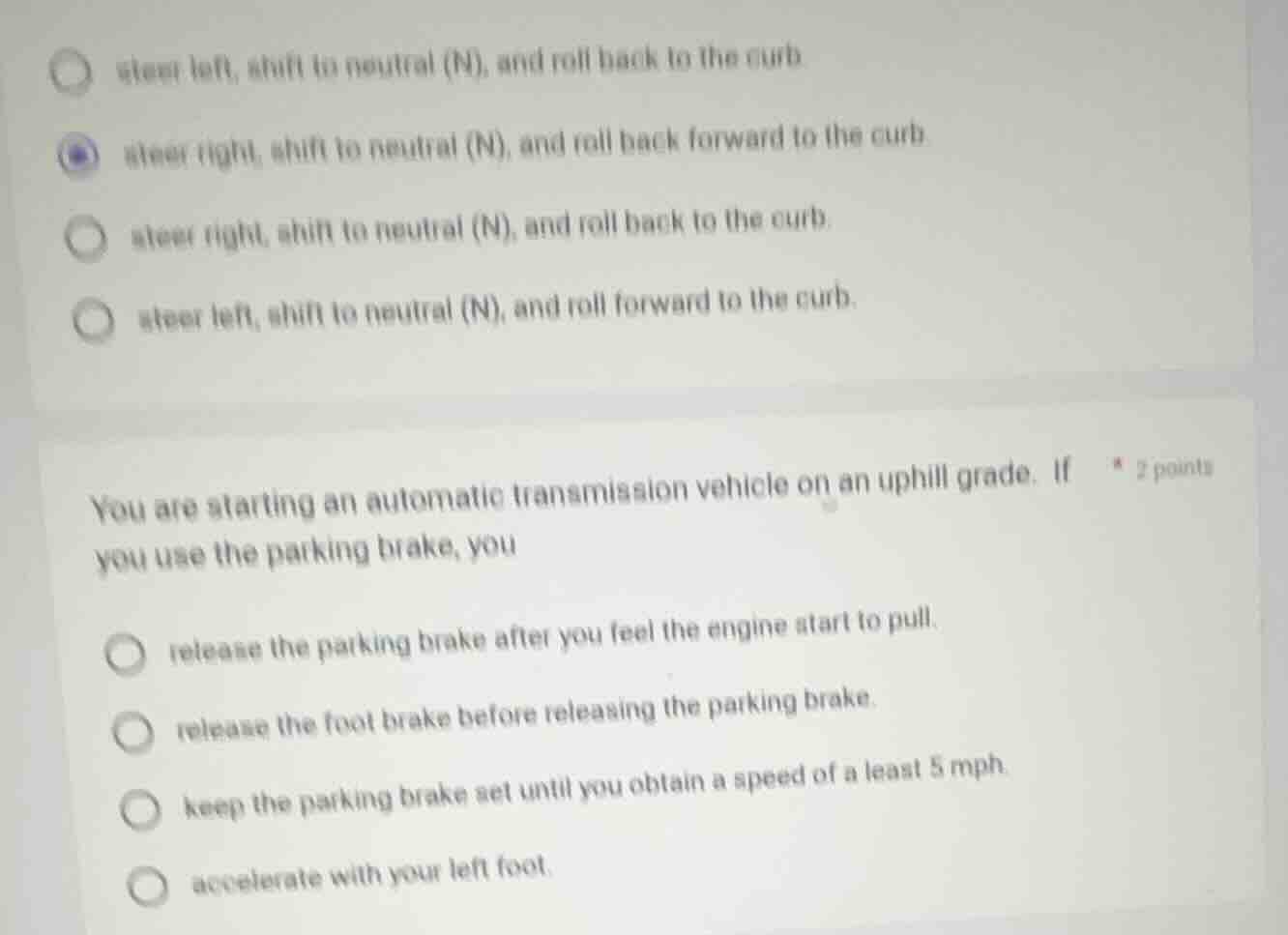 1.○ steer left, shift to neutral (n), and roll back to the curb● steer …