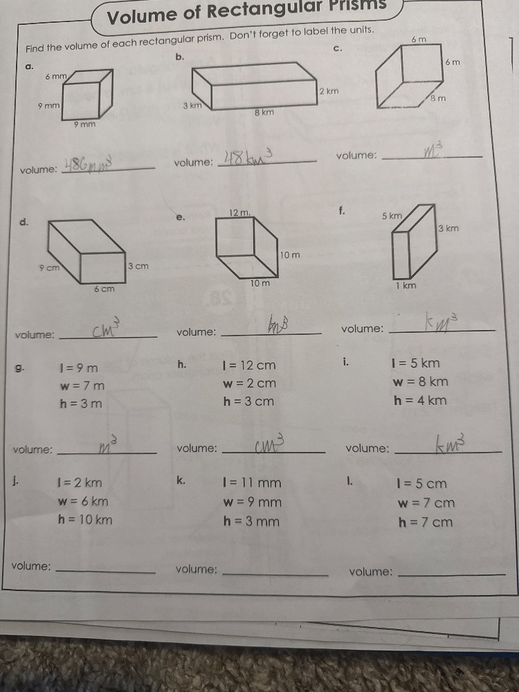volume of rectangular prisms find the volume of each rectangular prism.…
