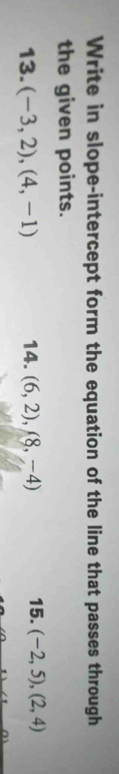 write in slope-intercept form the equation of the line that passes thro…