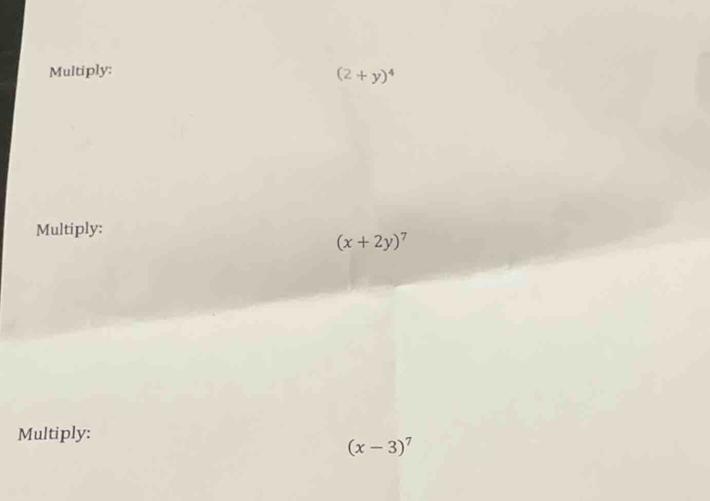 multiply: $(2 + y)^4$ multiply: $(x + 2y)^7$ multiply: $(x - 3)^7$