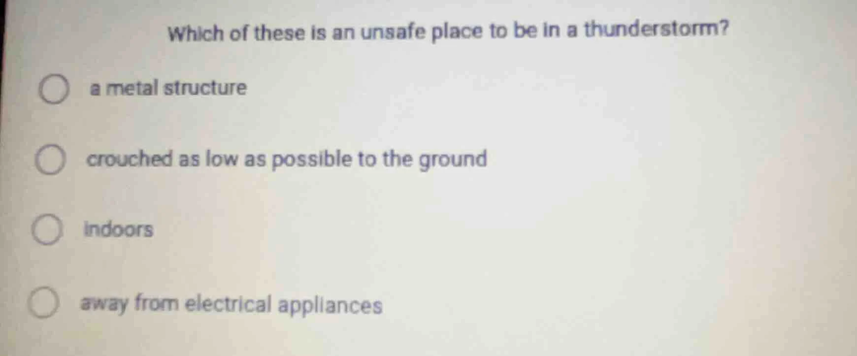 which of these is an unsafe place to be in a thunderstorm? a metal stru…